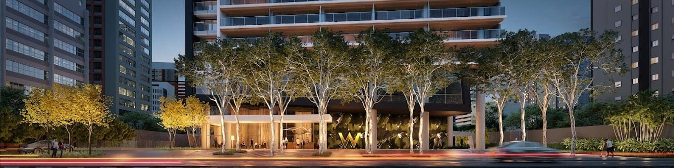 a building with trees in front of it