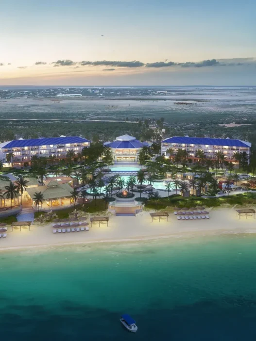 a group of buildings on a beach