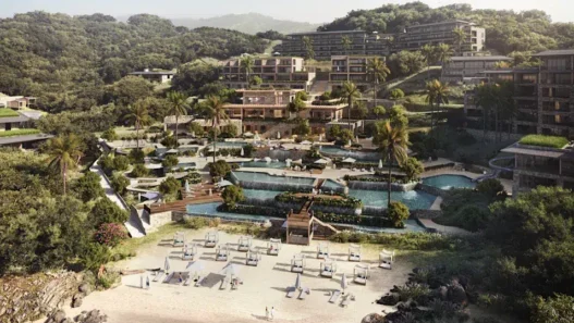 a resort with a pool and a beach