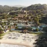 a resort with a pool and a beach
