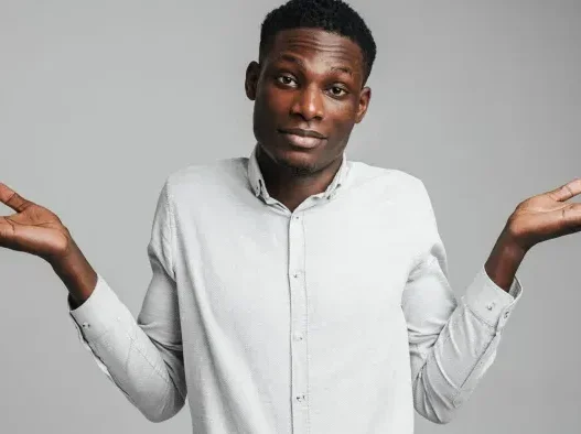a man with his hands up