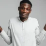 a man with his hands up