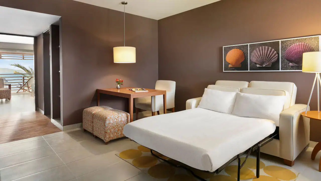 a room with a bed and a table