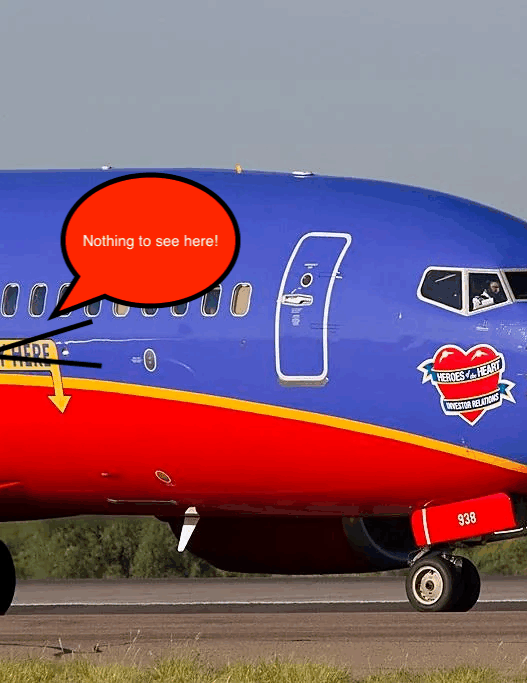 a blue and red airplane on a runway