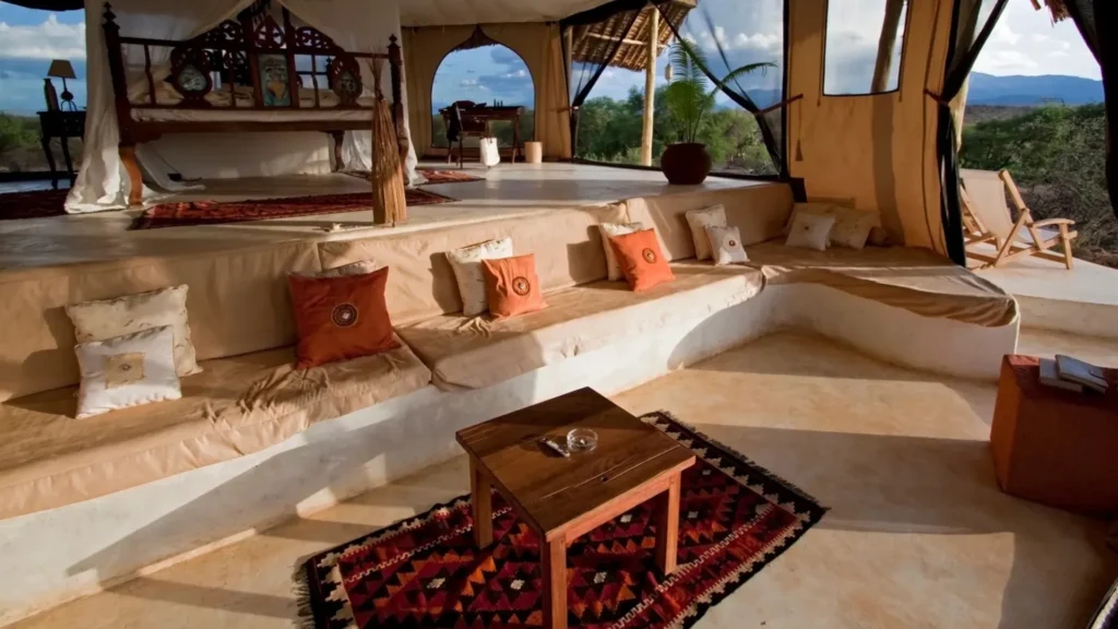 a room with a large couch and a table