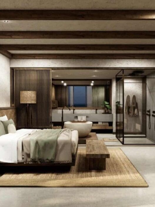 a bedroom with a large bed and a bathtub