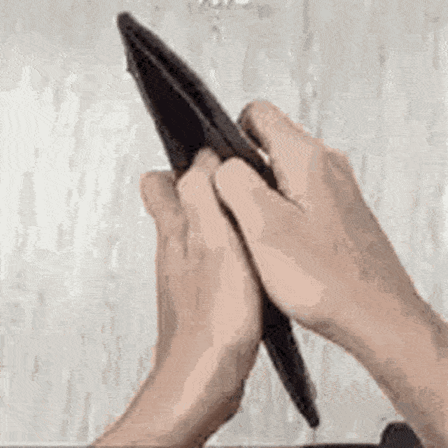 a person holding a tablet