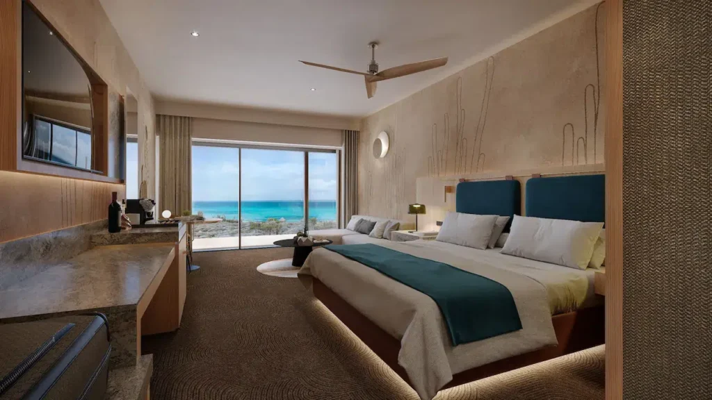 a room with a large bed and a window