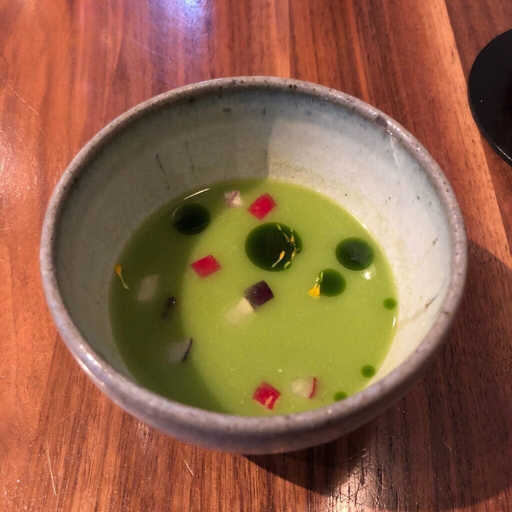 a bowl of green soup