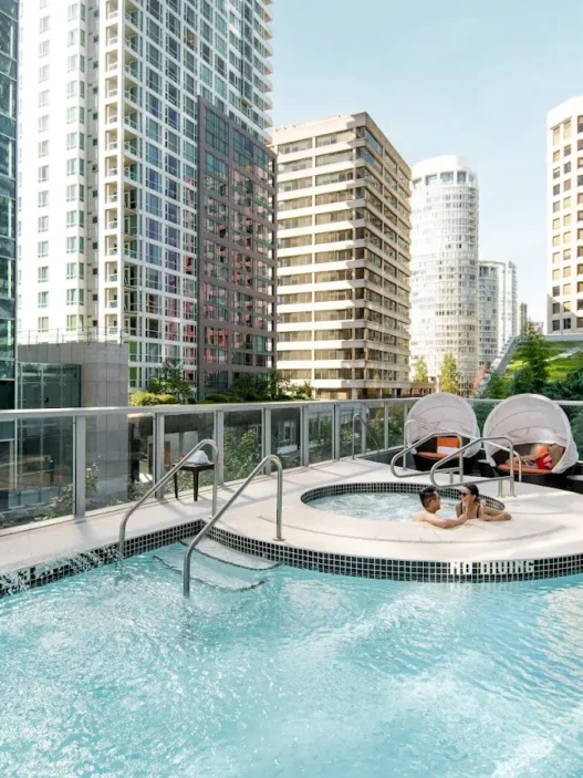 a pool with a couple of people in it