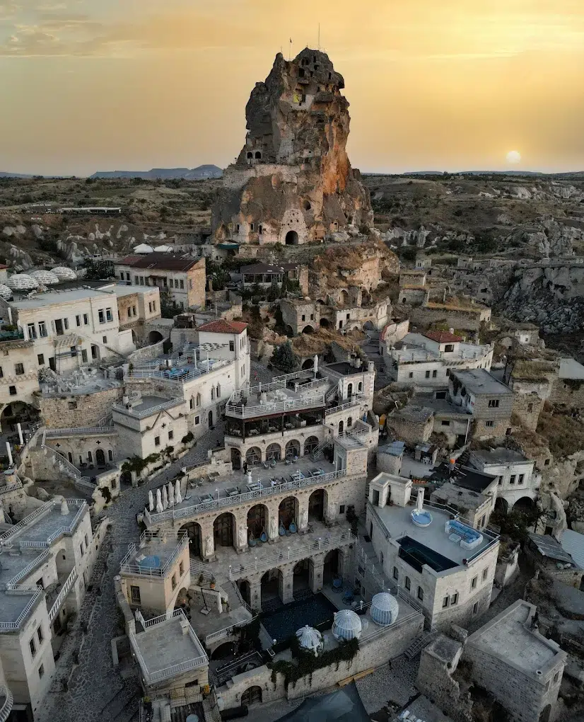 a city with a large rock formation