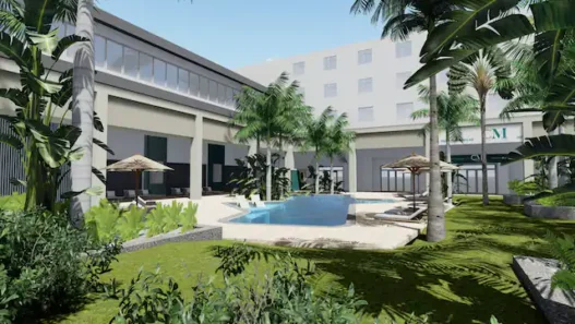 a pool in a courtyard of a building