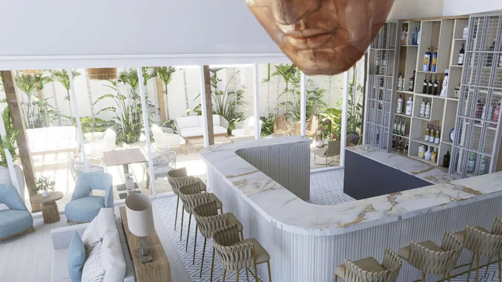 a room with a bar and a sofa and a large head from the ceiling