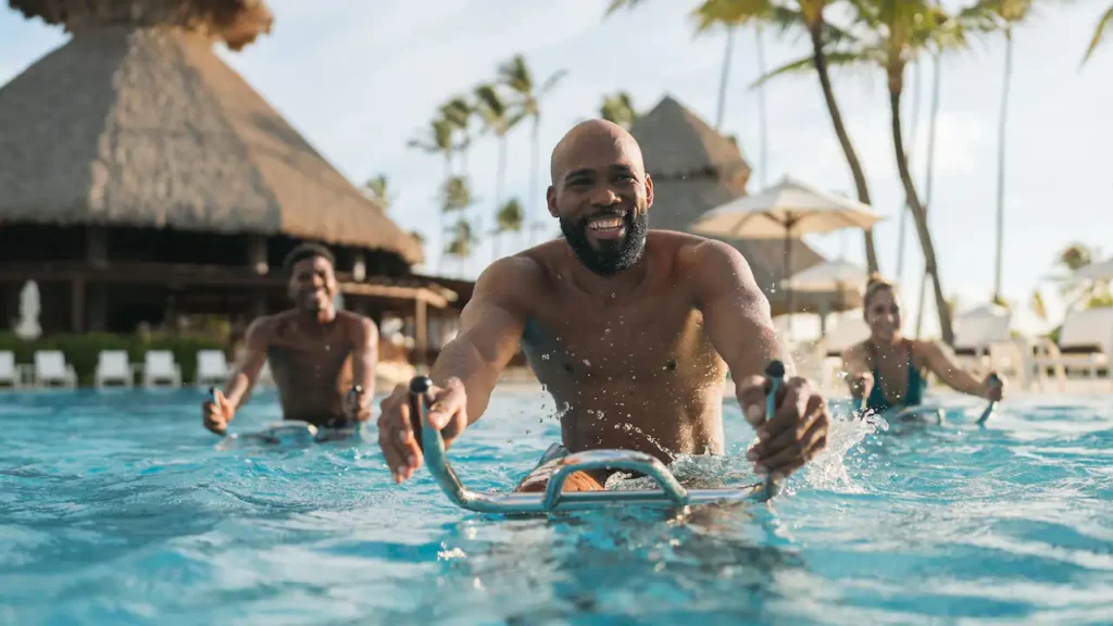 a man on a water bike in a pool