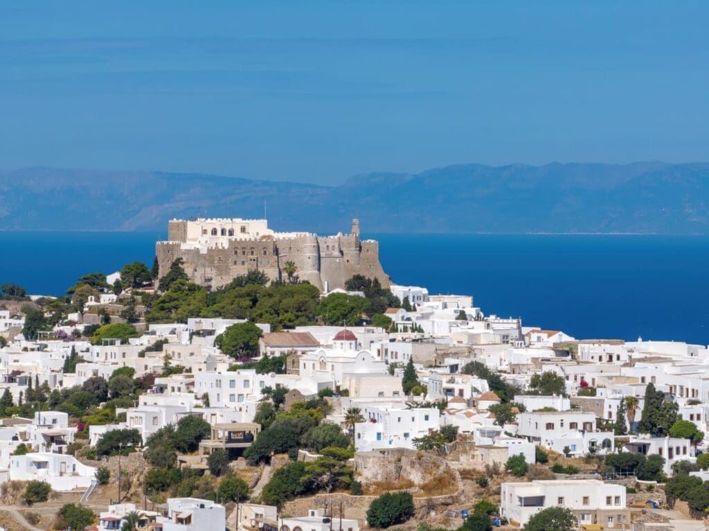 a white buildings on a hill