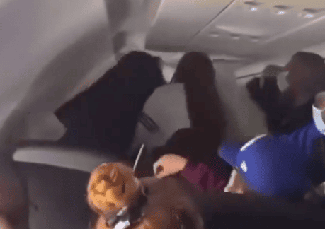 a person sitting on a plane