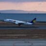 a plane taking off from a runway