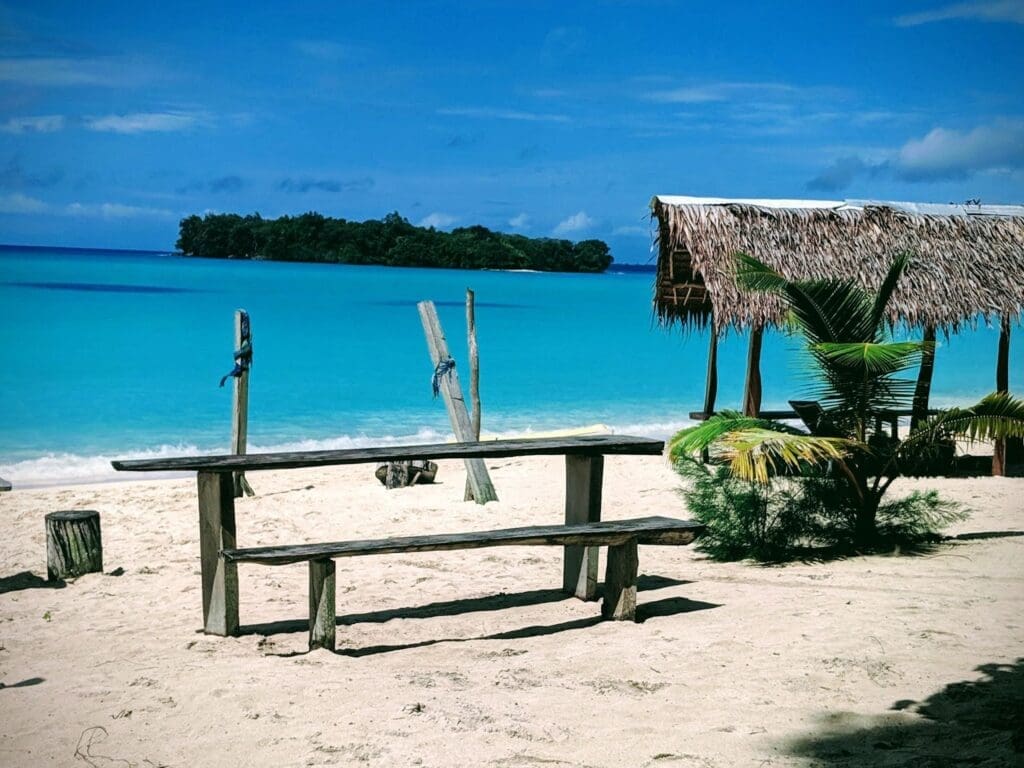 a bench on a beach
