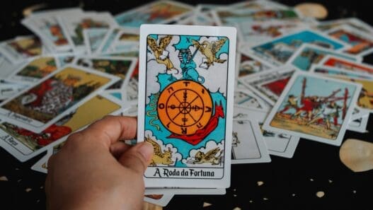 a hand holding a card